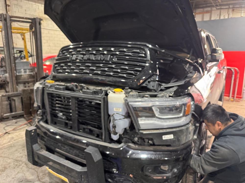 Ram 1500 front end being repaired after a collision